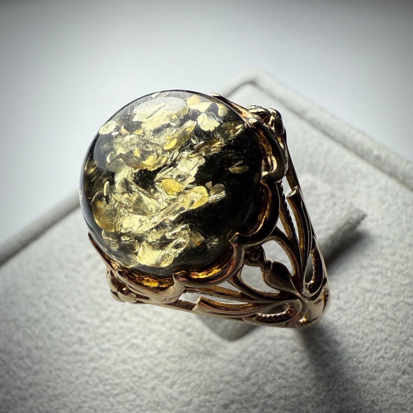 Green Piebald Amber Ring