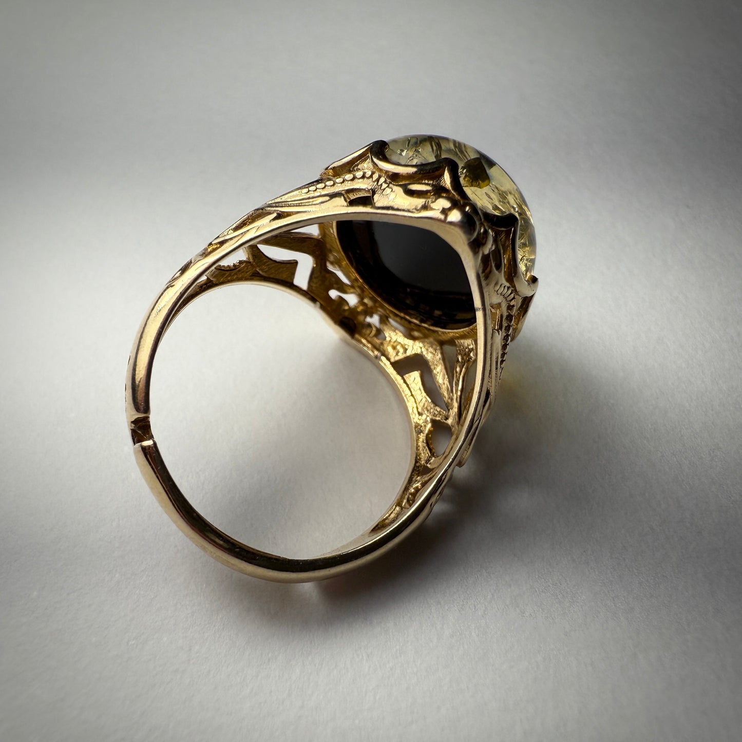 Green Piebald Amber Ring